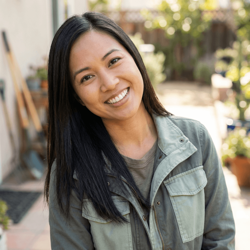 Emily Rodriguez smiling at her front door